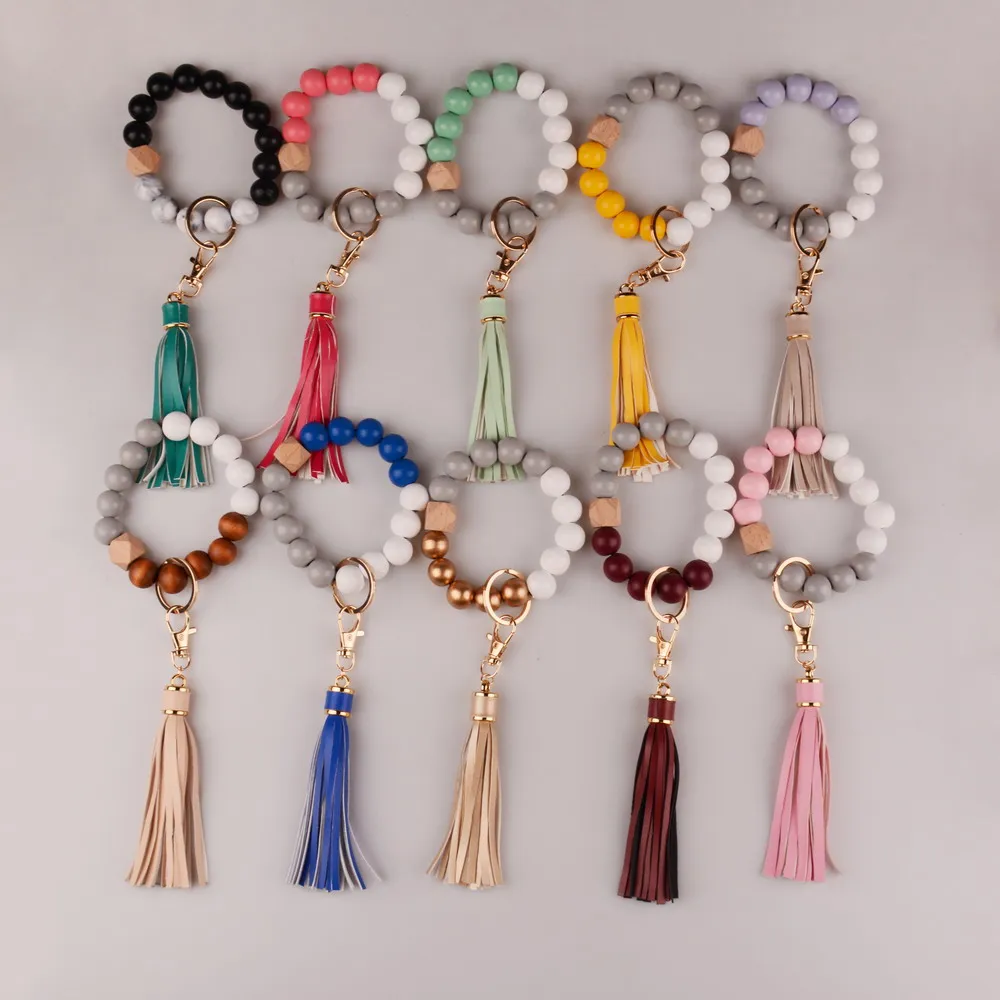 Keychain Za Ključe Usnje Tassel Lesa Kroglice Zapestnico, Obesek Za Ključe, Za Ženske Pribor Multicolor Keychain Debelo Vroče Prodaje 2021